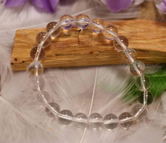 Bracelet cristal de roche perles de 8mm favorisant l'amplification nergtique